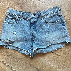 Levi’s 311  Light Blue Distressed Denim Cutoff Shorts